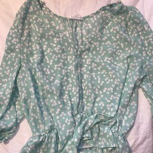 Light blouse with flowers. Perfect for spring and summer weather.
